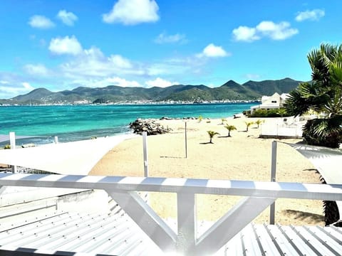 On the beach, sun loungers, beach towels