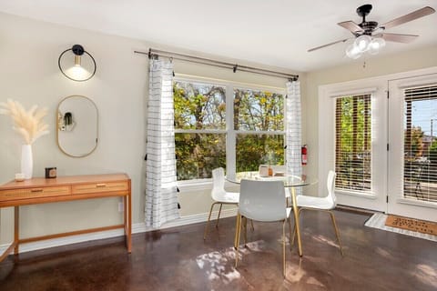 Between the two spaces, find our 4-top dining table.