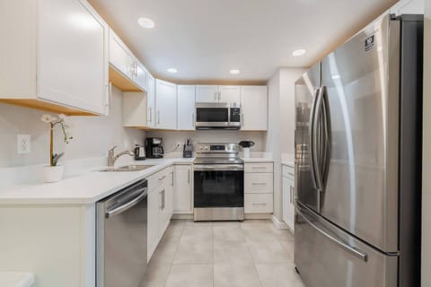 Cook in our kitchen, complete with new countertops, stainless steel appliances, and all the necessary essentials for crafting delicious homemade meals.