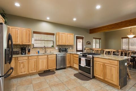 Well Stocked Kitchen - Open to Dining and Living Rooms