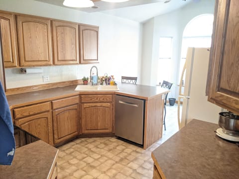 Huge kitchen with multiple lighting options to set the mood for a relaxing space