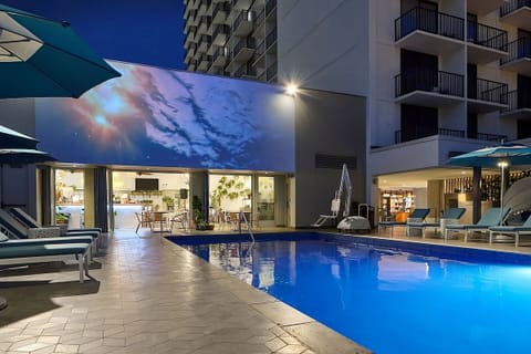 A rooftop pool, sun loungers