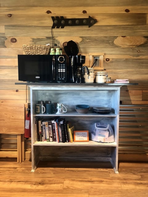Coffee bar includes dishes for 3, microwave, coffee maker, coffee, tea, sugar...