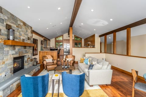High vaulted ceilings bring the outside Tahoe views in