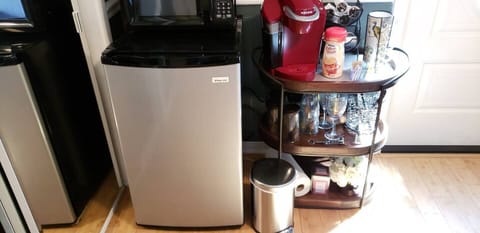 Fridge, microwave, coffee/tea maker, paper towels