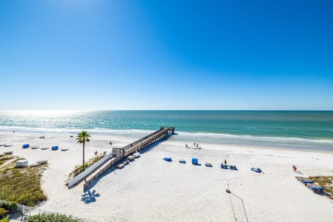 On the beach, sun loungers, beach towels