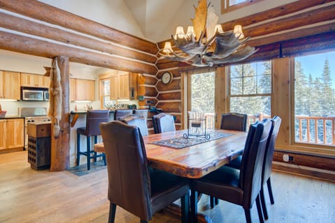 Attractive Alaska moose horn chandler. MT log crafted table.