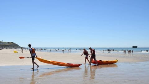 On the beach, sun loungers