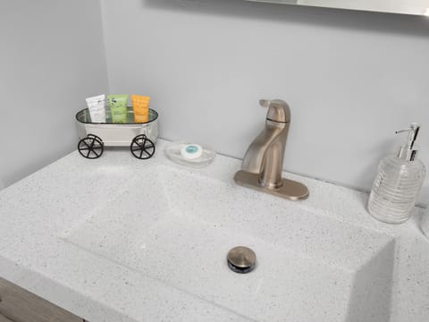 Combined shower/tub, hair dryer, towels, soap