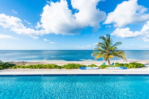 On the beach, sun loungers, beach towels