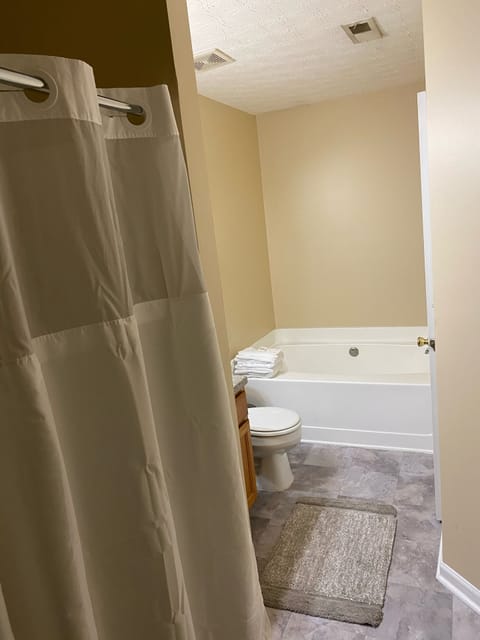 Combined shower/tub, towels, soap, toilet paper