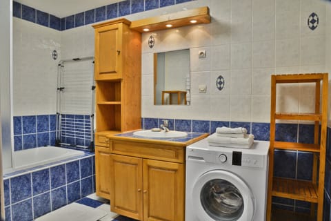 Combined shower/tub, hair dryer, towels, toilet paper