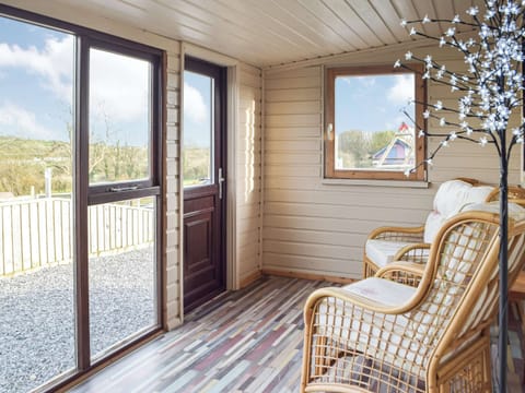 Sun room | Marros Hill Log Cabin, Marros, near Pendine