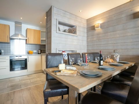 Table, Furniture, Countertop, Cabinetry, Wood, Kitchen, Chair, Flooring, Interior Design, Floor