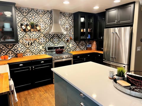 Stainless steel chef's kitchen stocked with all of your essentials