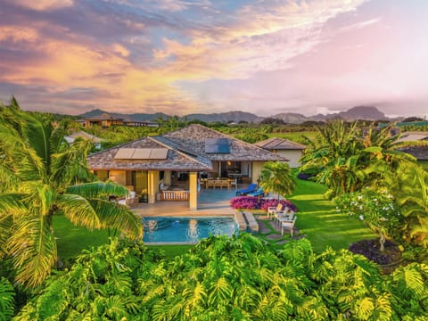 A heated pool, sun loungers