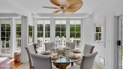 The dining area with additional seating at the kitchen table...