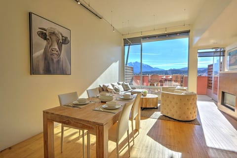 Open living and dining area with mountain views