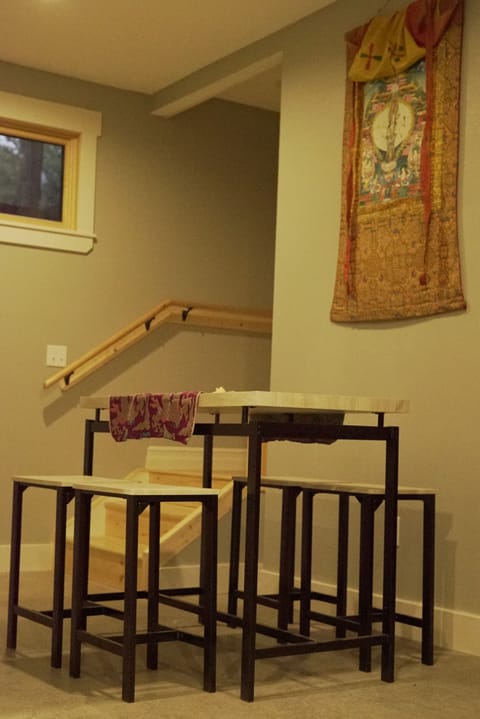 Bottom Level Dining Area
A multi-purpose room with a cozy 4-seater table.