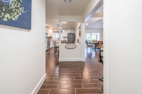 Front entryway breaks left to the kitchen and right to the living room