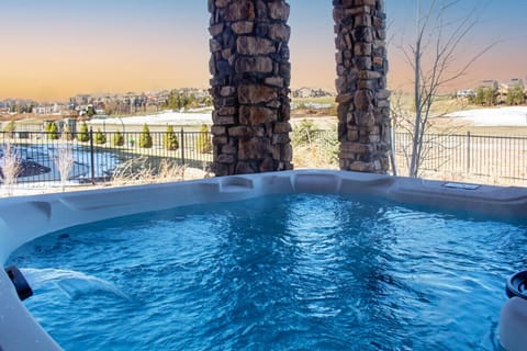 Outdoor Hot Tub Oasis: Soak your cares away in the hot tub outside of Sunset Casa.