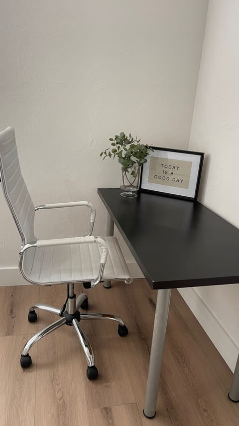 Desk and chair located bedroom number 3