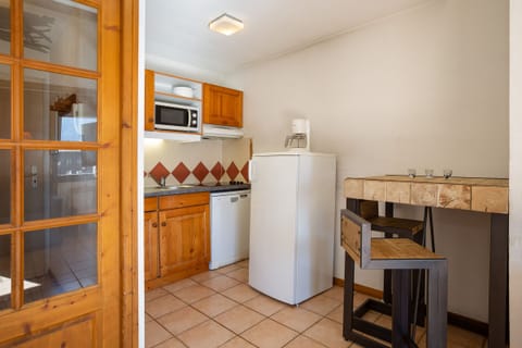Well equipped kitchen with a dining area