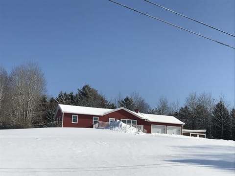 View of house in winter.   