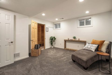 Escape to the finished basement of this home for some rest and relaxation in the yoga room or sauna.