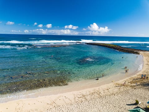 On the beach, sun loungers, beach towels