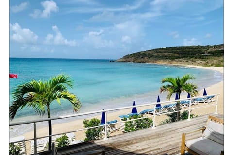 On the beach, sun loungers