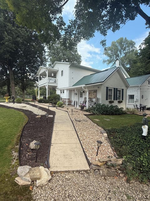 View of your walkway all lit up at night.