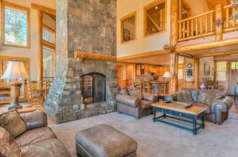 Living room looking into kitchen and dining room