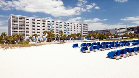 On the beach, sun loungers, beach towels