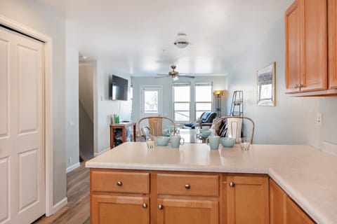 View from kitchen into open dining and living area