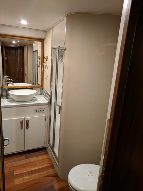 Combined shower/tub, jetted tub