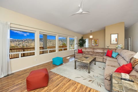 Living room with views of patio and P Mountain