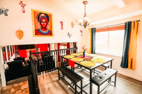 A dining area so spotless, it reflects the care and warmth poured into every meal. It's the heart of the home, where clean lines meet inviting spaces, ready for gatherings that nourish both body and soul.