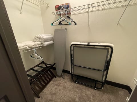Bdr2 walk-in closet - luggage rack & twin size rollaway bed memory foam mattress
