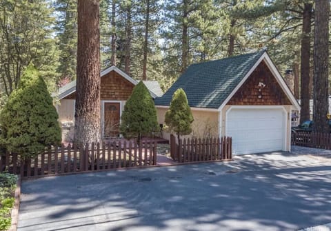 Front of Cabin with one car garage safe storage for gear.