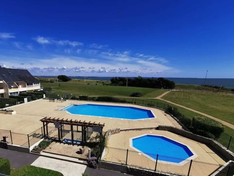 Water, Sky, Water Resources, Property, Building, Cloud, Swimming Pool, Azure, Shade, Plant
