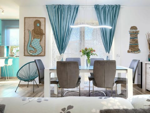 Decoration, Property, Window, Building, Plant, Table, Blue, Azure, Couch, Textile