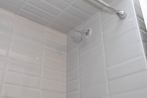 Combined shower/tub, hair dryer, towels, soap