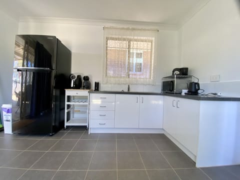 Fridge, microwave, coffee/tea maker, electric kettle