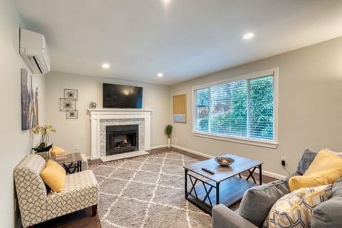 Beautifully Remodeled and Open Living Room with 55" Smart TV and AC to cool down