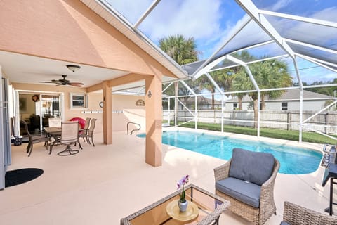 Outdoor pool, a heated pool, pool umbrellas