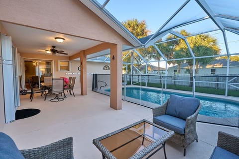 Outdoor pool, a heated pool, pool umbrellas