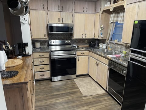 Marble counters.  Electric stove, Microwave, Dishwasher, Refrigerator