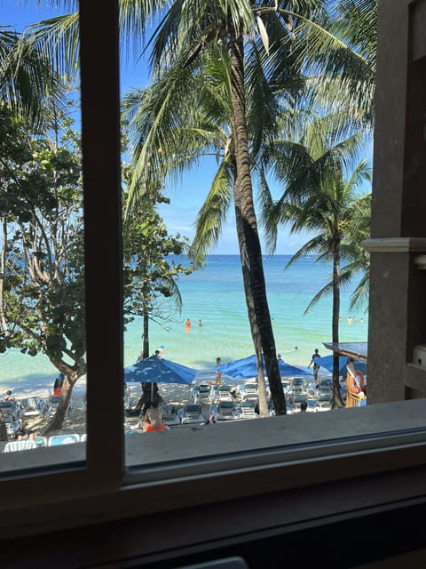 On the beach, sun loungers, beach towels