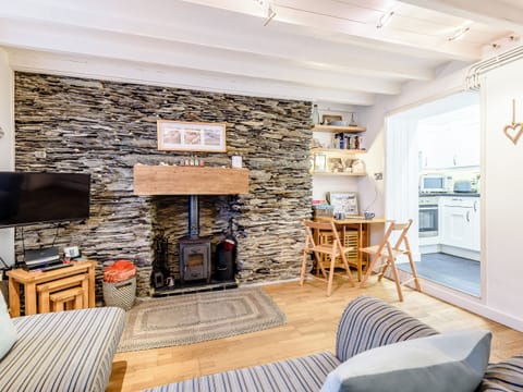 Welcoming living area with wood burner | Pebble Cottage - Aberlovely Holidays, Aberdovey